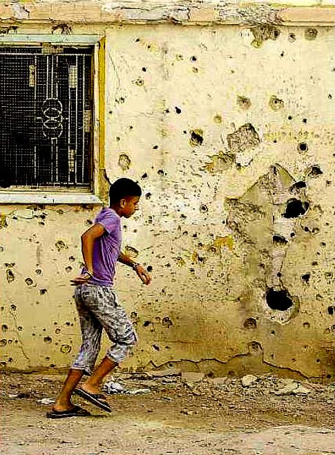 muri "pieni di spari" ad Aleppo (Siria); fonte Malla