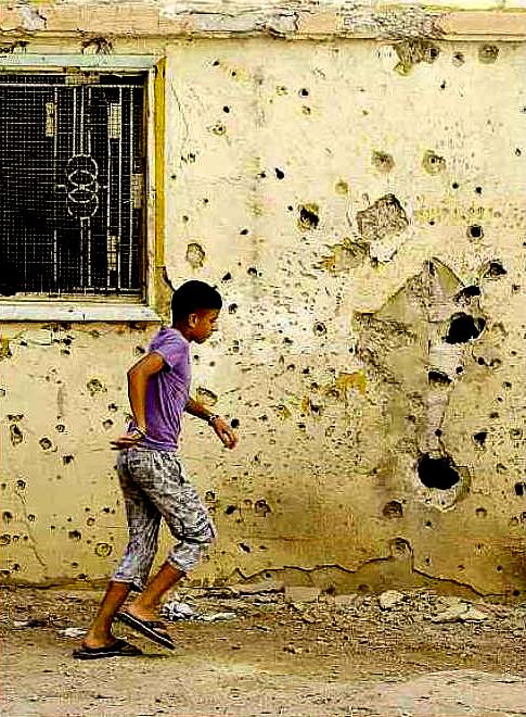 muri "pieni di spari" ad Aleppo (Siria); fonte Malla